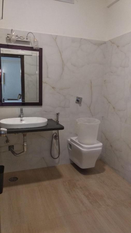 Grand Milestone Hotel Mysore Bagian luar foto
